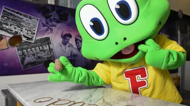 Freddo piping his name with chocolate at Cadbury World